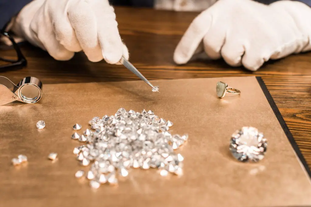 Home - Crystal Myths - cropped view of jewelry appraiser holding gemstone 2022 12 16 21 08 33 utc